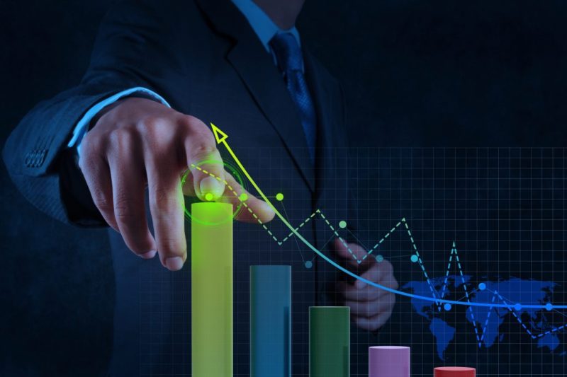 Businessman Hand Working With Virtual Chart Business On Touch Sc